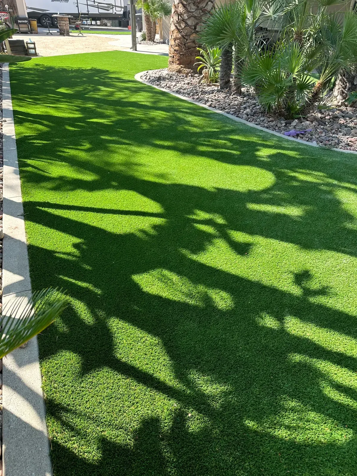 Residential artificial grass installation — backyard lawn